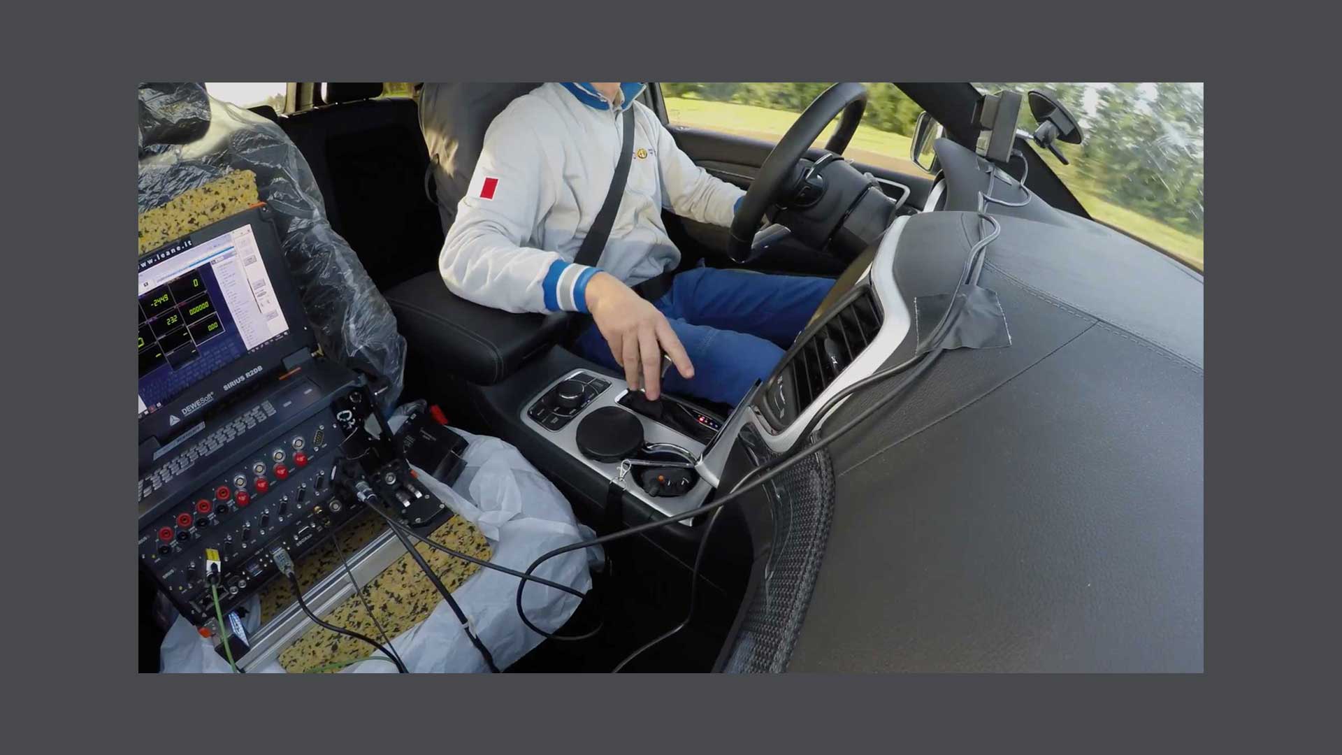 Photo of the passenger compartment of an automobile with instruments to carry out tests and measurements