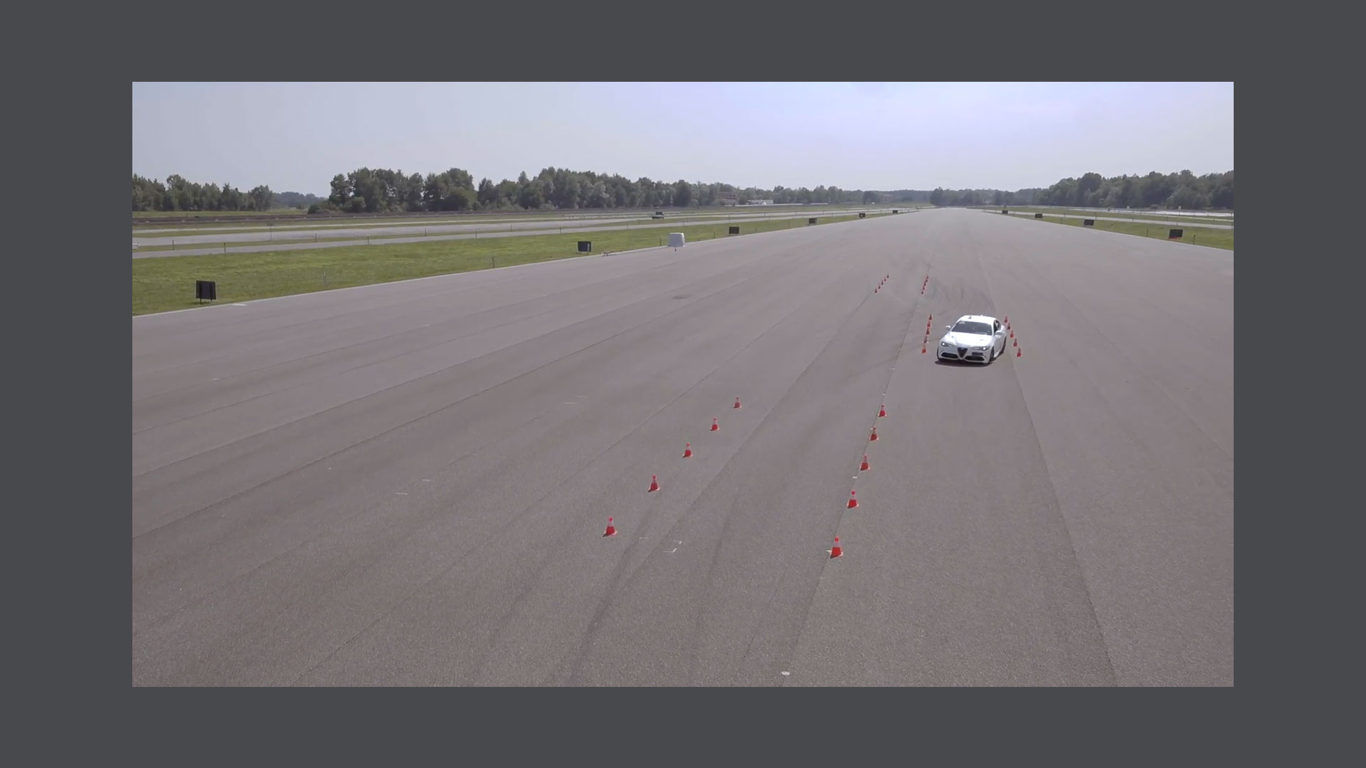 Photo of a white car on the track