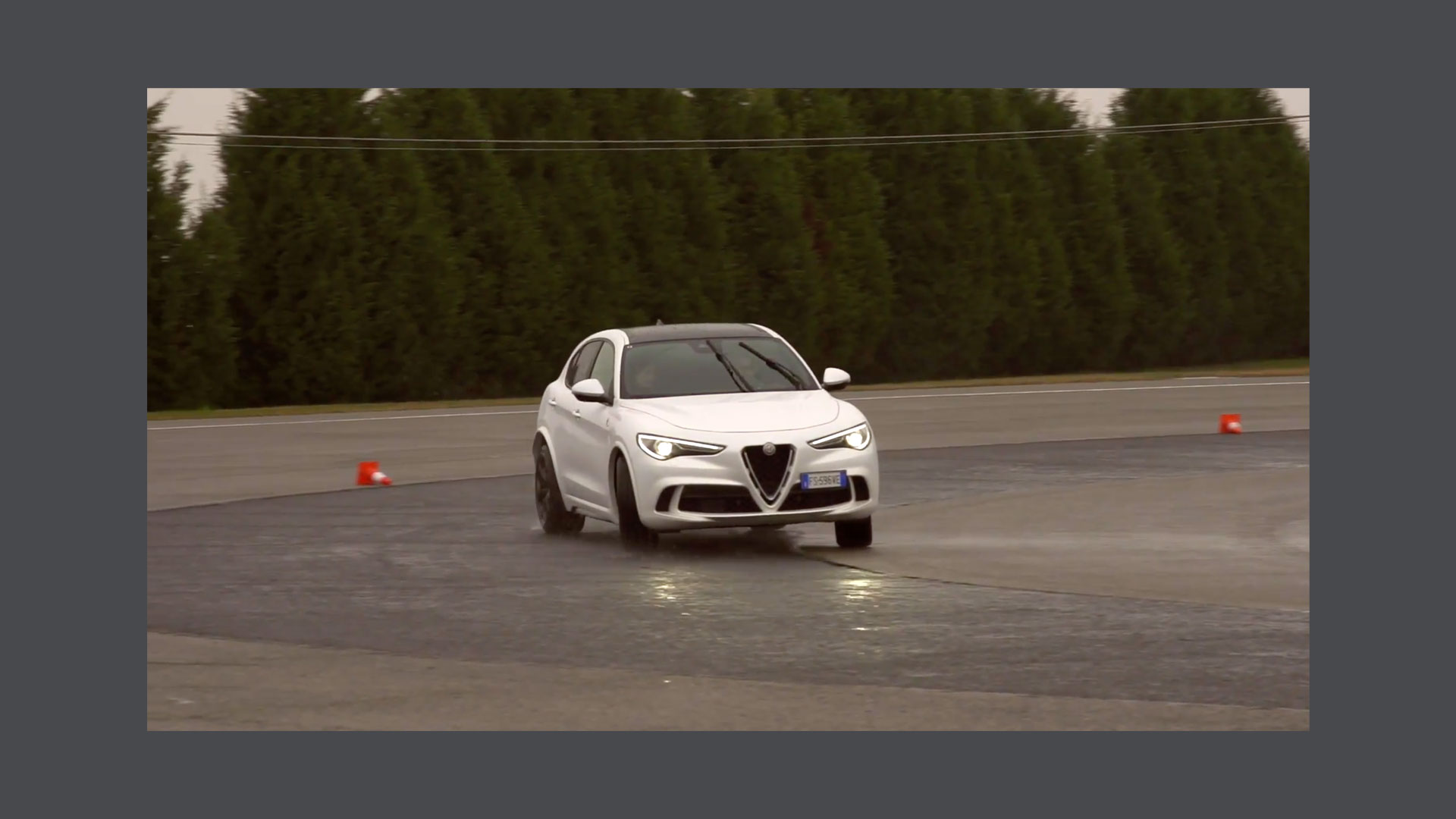 Photo of a white car on the track