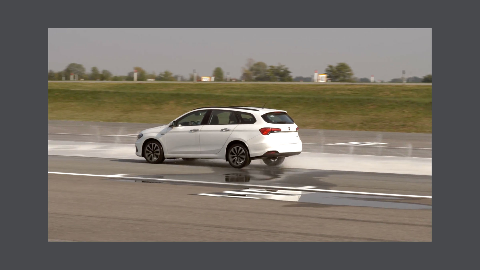 Photo of a white car on the track