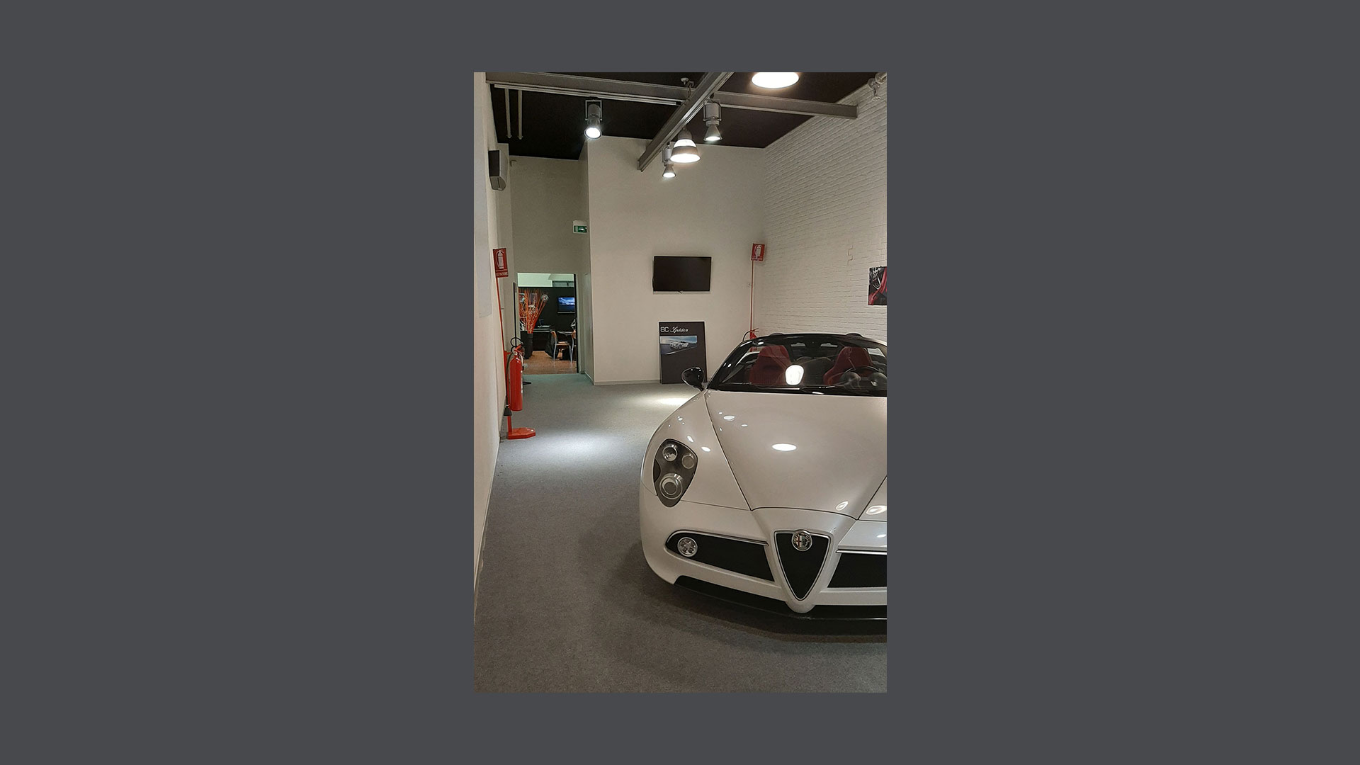 Photo of an Alfa Romeo set up inside the Autodelta