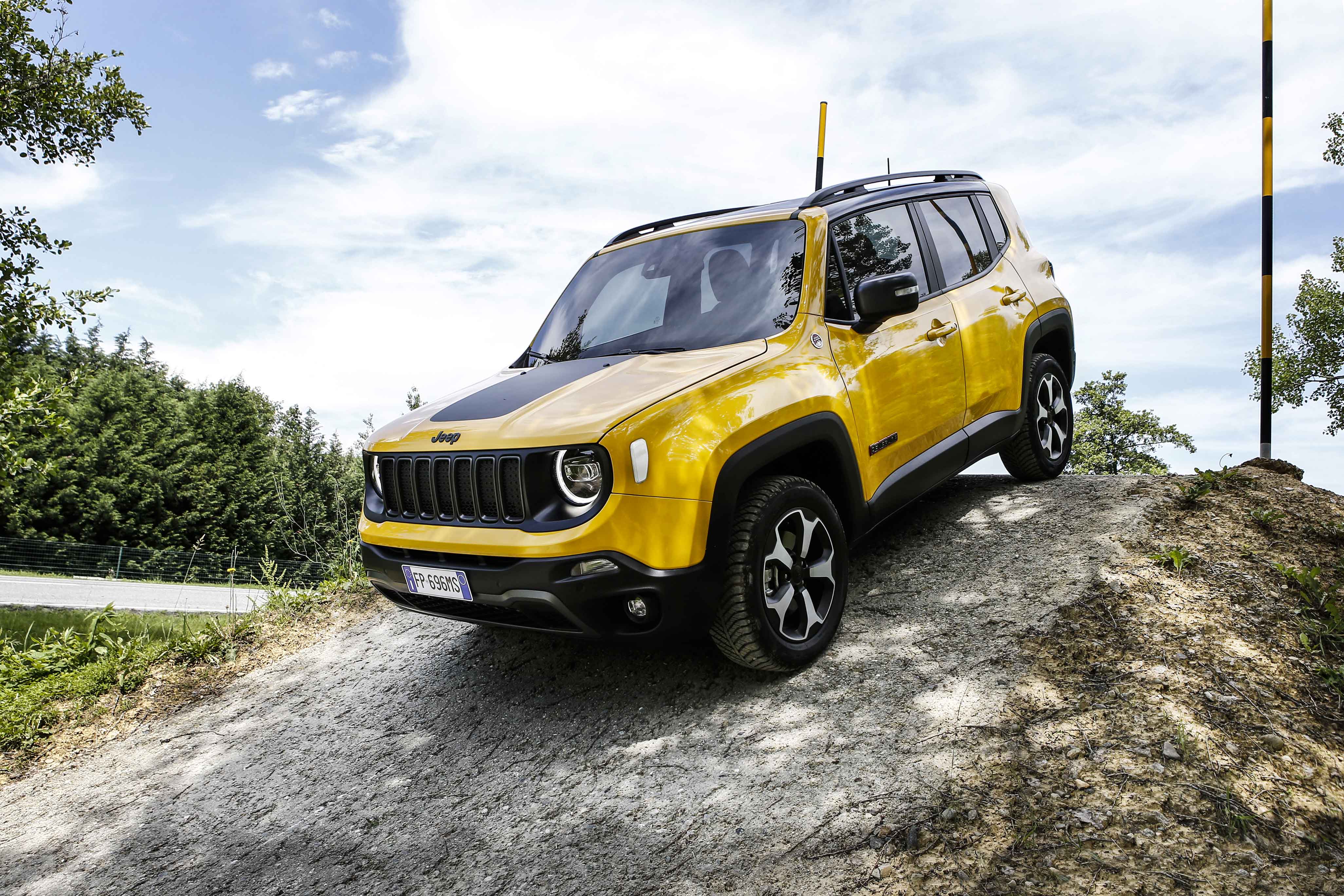 Photo of a yellow Jeep on a dirt and downhill section of the Off Road Track