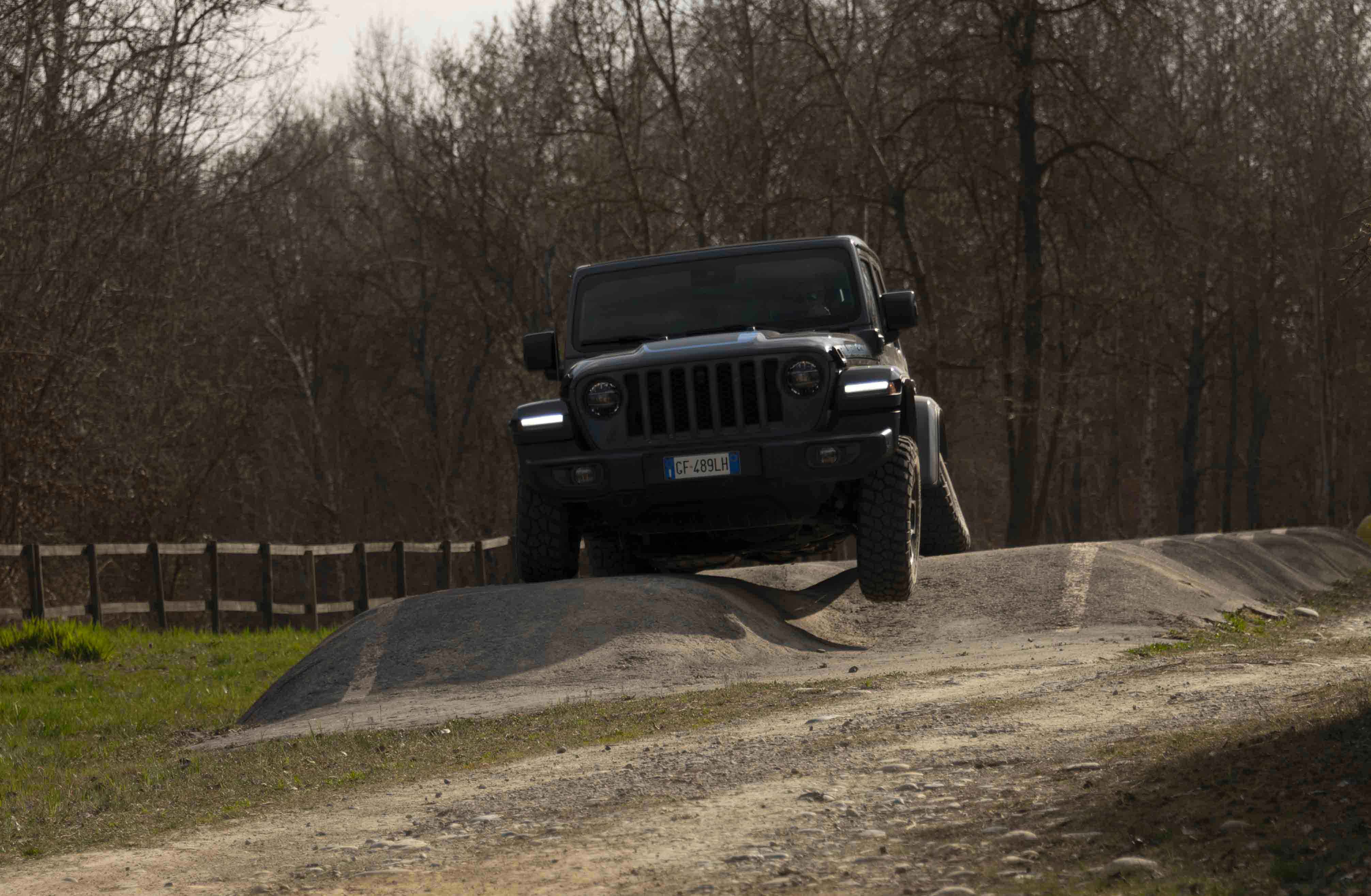 Photo of a gray Jeep tackling sloping obstacles