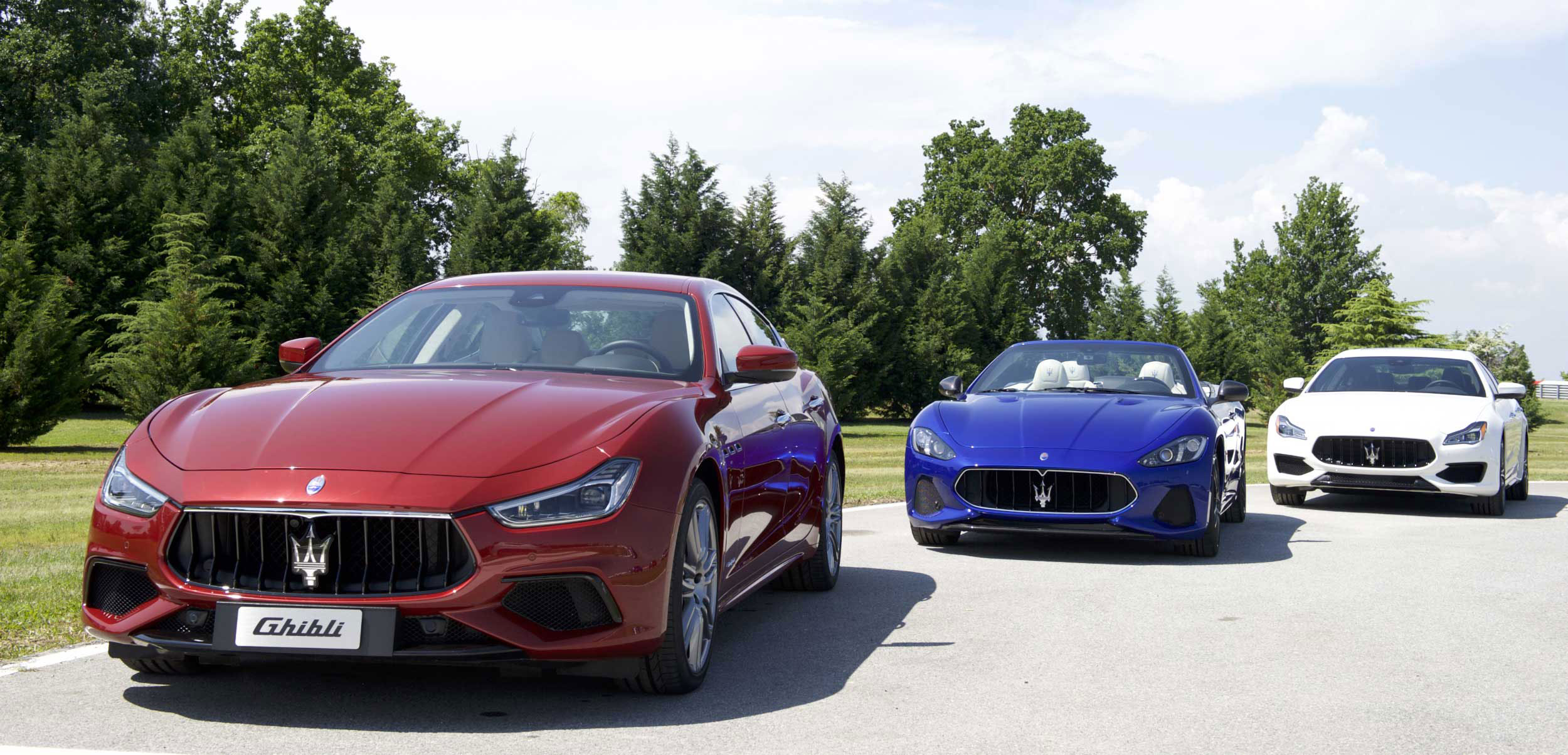 Photo of three parked Maserati